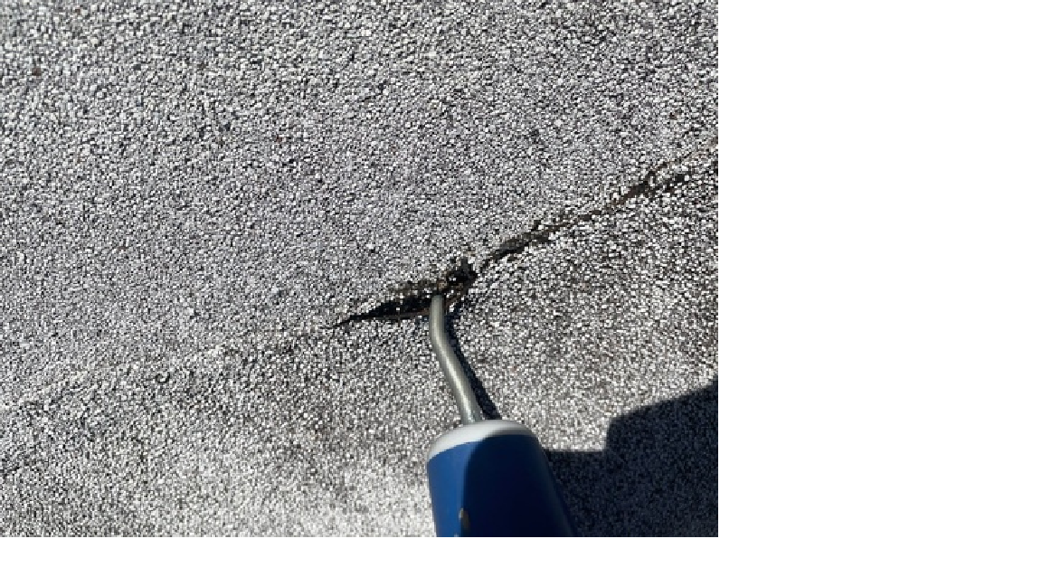 How to apply tar or liquid flashing on a flat roof.