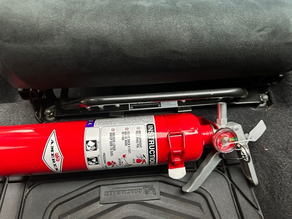 Amerex fire extinguisher and Bracketeer seat bracket.