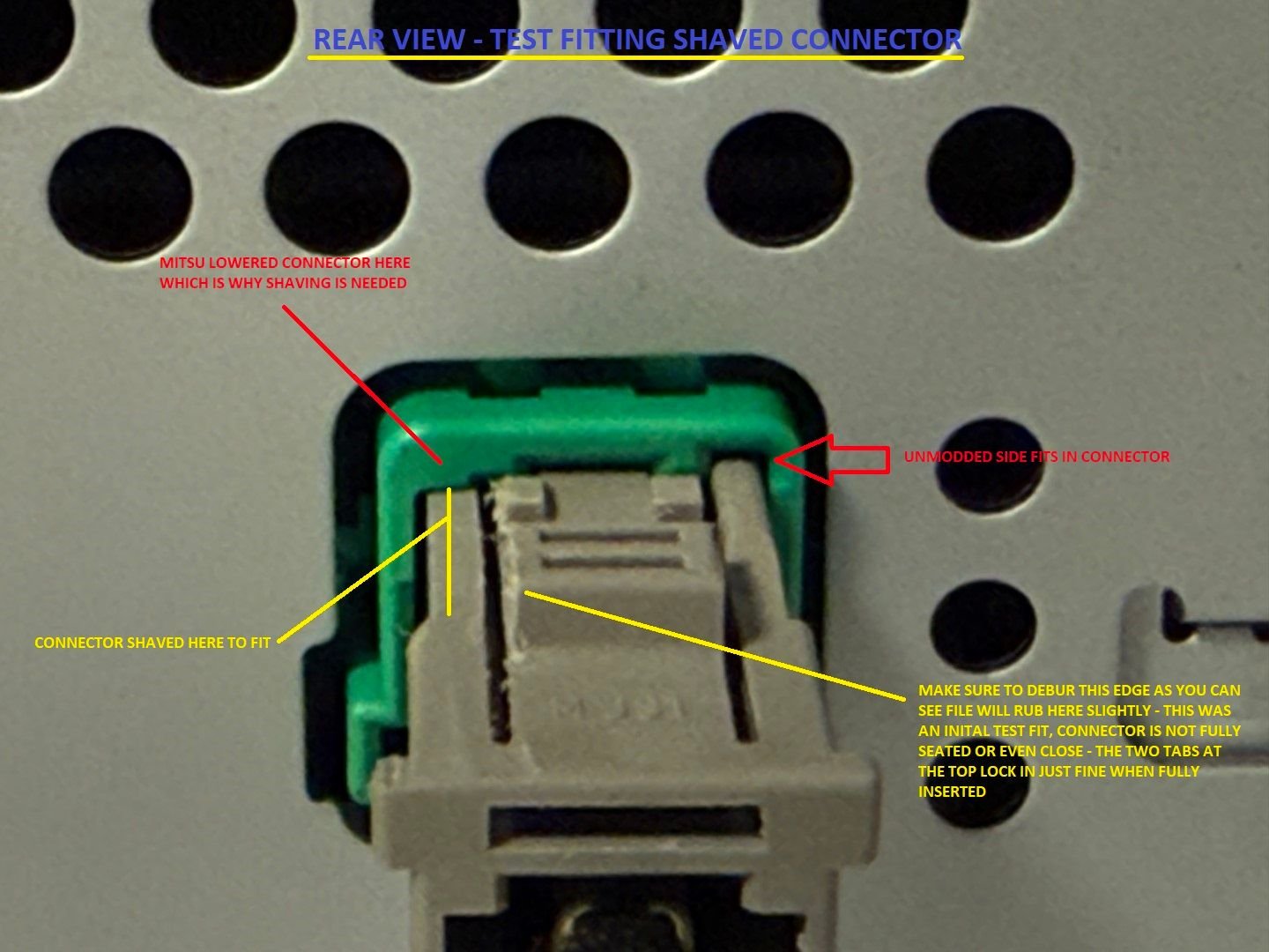 Once you can see the side of the connector you filed is flat it is going to fit, but can't hurt to double check by partially inserting it before deburring it and blowing it out