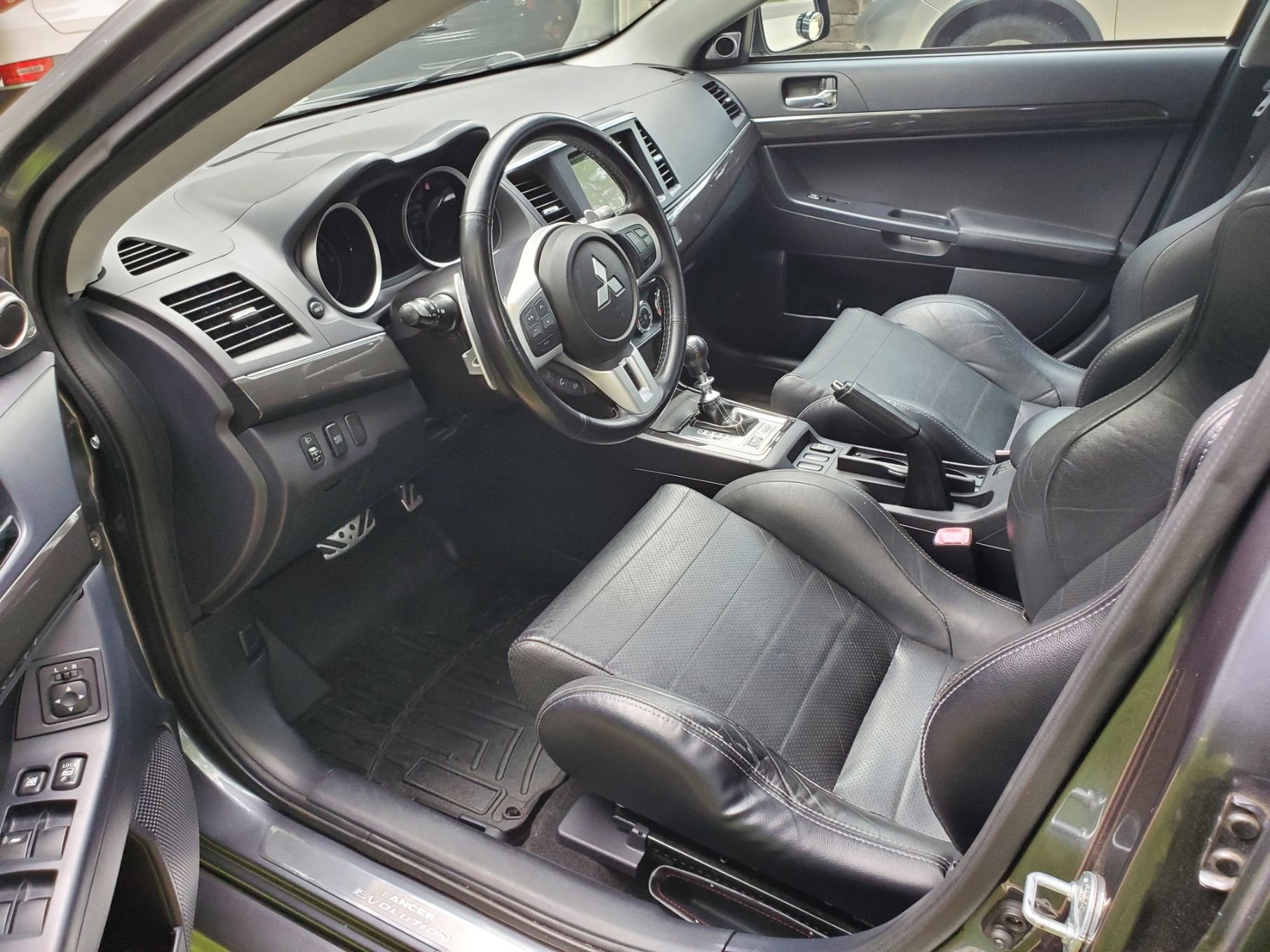 2010 Mitsubishi Lancer Evolution - 2010 Mitsubishi Lancer Evolution X MR Touring - Graphite Gray (Mostly Stock) - Used - VIN JA32W5FV0au030566 - 65,909 Miles - 4 cyl - AWD - Automatic - Sedan - Gray - Charlotte, NC 28209, United States