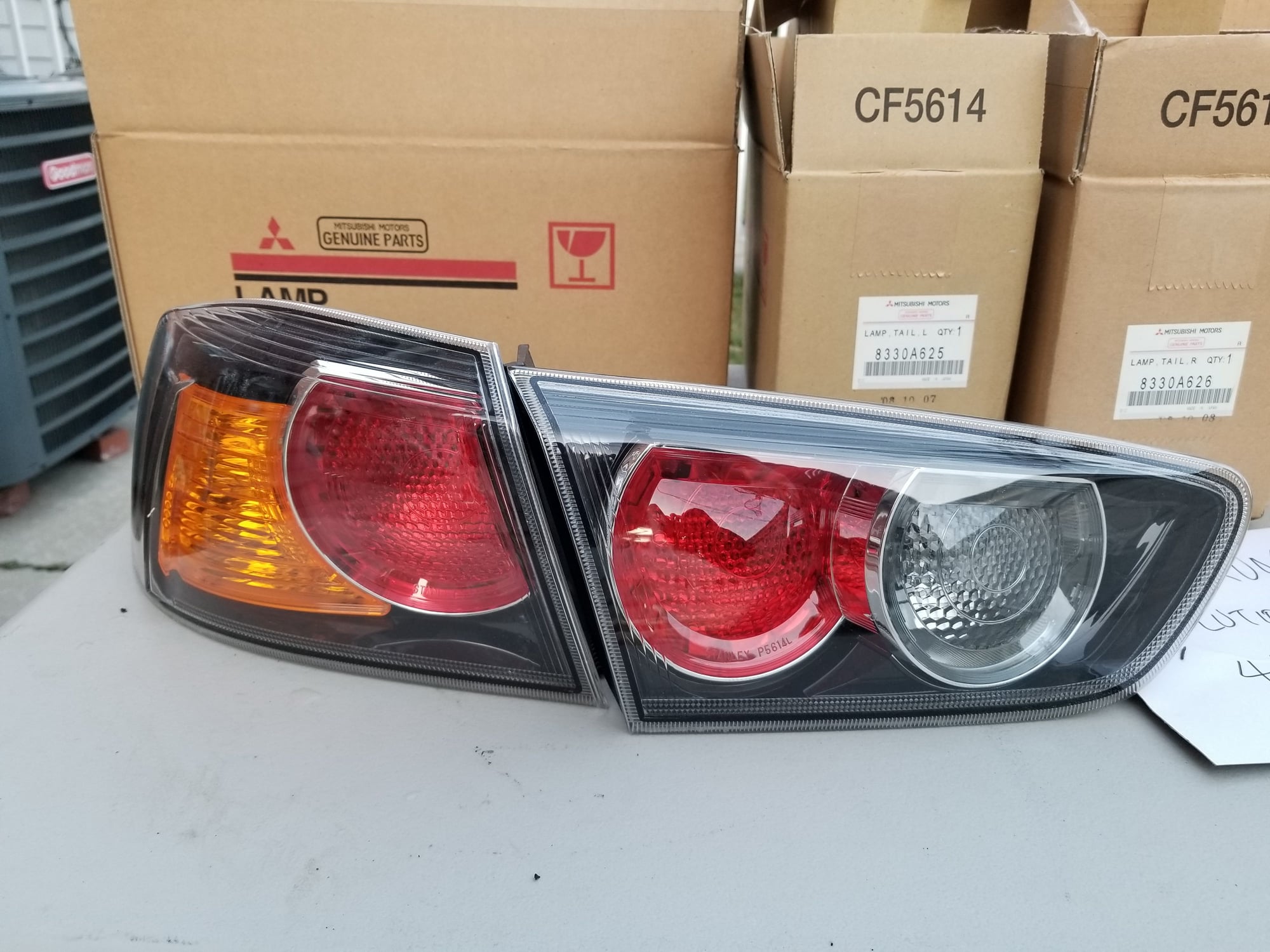 Exterior Body Parts - FS: Mitsubishi OEM Ralliart tail lights/ Brand New set of OEM Rear trunk emblems - Used - 2008 to 2015 Mitsubishi Lancer Evolution - Brooklyn, NY 11211, United States