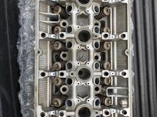 Head back from the machine shop, with the evo 9 valves and new valve seals. Decked, hot tanked and cleaned.