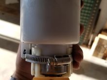 Low Profile worm clamp.  I used two ZipTies like the OPP did, and after 6 days of tuning and testing with multiple boost pulls, everything was intact.  ZipTIes had not broken or stretched.  However, keeping with holding as much pressure and to be robust as possible, use low pro worm clamp.  THese buggers are not as easy as the opp said to find, but I found 1.  If you can't find a low pro worm gear, then get a CV axle clamp, for they are low profile as well.