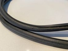 ^Close-in shot of the 10-years-old Evo X sunroof weather strip