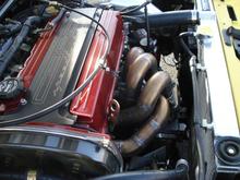 Side shot...JM Fab. manifold, CBRD BBK turbo, O2 housing, CBRD slim race radiator with slim fan...