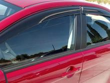 Window visors and Blacked out window trim
