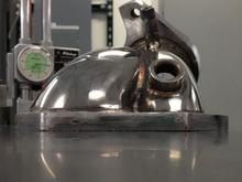 Flange is flat except for the top edge which isn't required to seal.