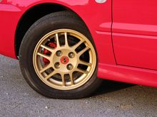 Painted the calipers and rims and added a vintage Mitsubishi Lancer center cap.