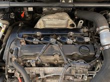 Old plastic valve cover. I used a Sharpie metallic silver marker to mark the ignition coils.