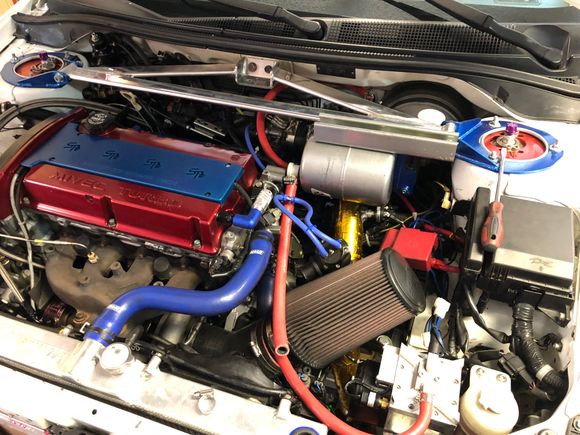 Stage V head and ported everything.  Billet vacuum pump bottom right.  Additional volume reservoir canister for brake booster on strut brace.  