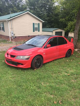 The carbon wrap has been removed from the hood and roof.