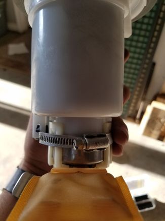 Low Profile worm clamp.  I used two ZipTies like the OPP did, and after 6 days of tuning and testing with multiple boost pulls, everything was intact.  ZipTIes had not broken or stretched.  However, keeping with holding as much pressure and to be robust as possible, use low pro worm clamp.  THese buggers are not as easy as the opp said to find, but I found 1.  If you can't find a low pro worm gear, then get a CV axle clamp, for they are low profile as well.