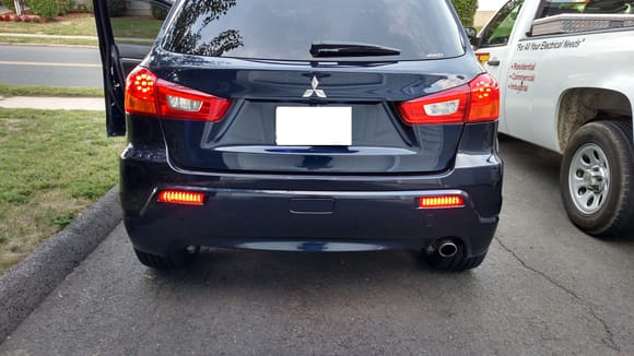 custom installed rear lights from a lancer, a little trimming involved