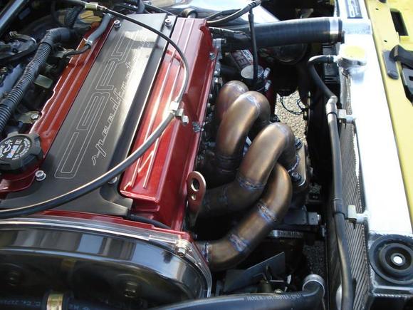 Side shot...JM Fab. manifold, CBRD BBK turbo, O2 housing, CBRD slim race radiator with slim fan...