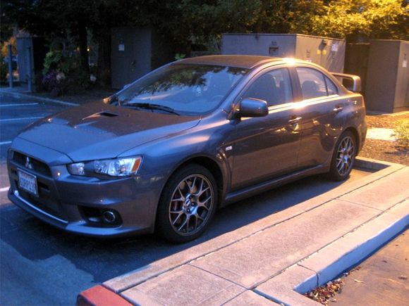 Evening shot of Nox in his usual spot outside my workplace.