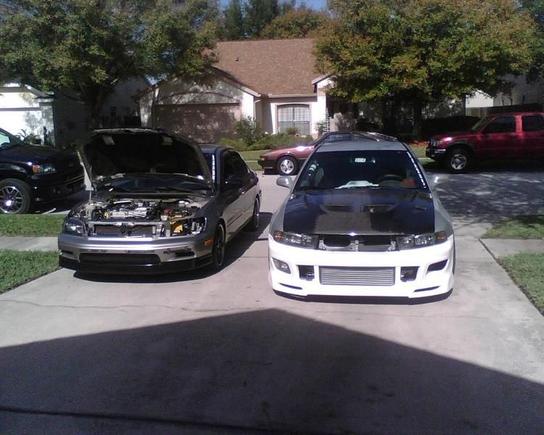 working on my car, next to my brothers project, 
(boosted galant)!!***