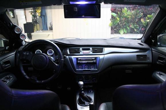 Dual steering wheel guage pod and carbon pillar pod with matching passenger pillar.