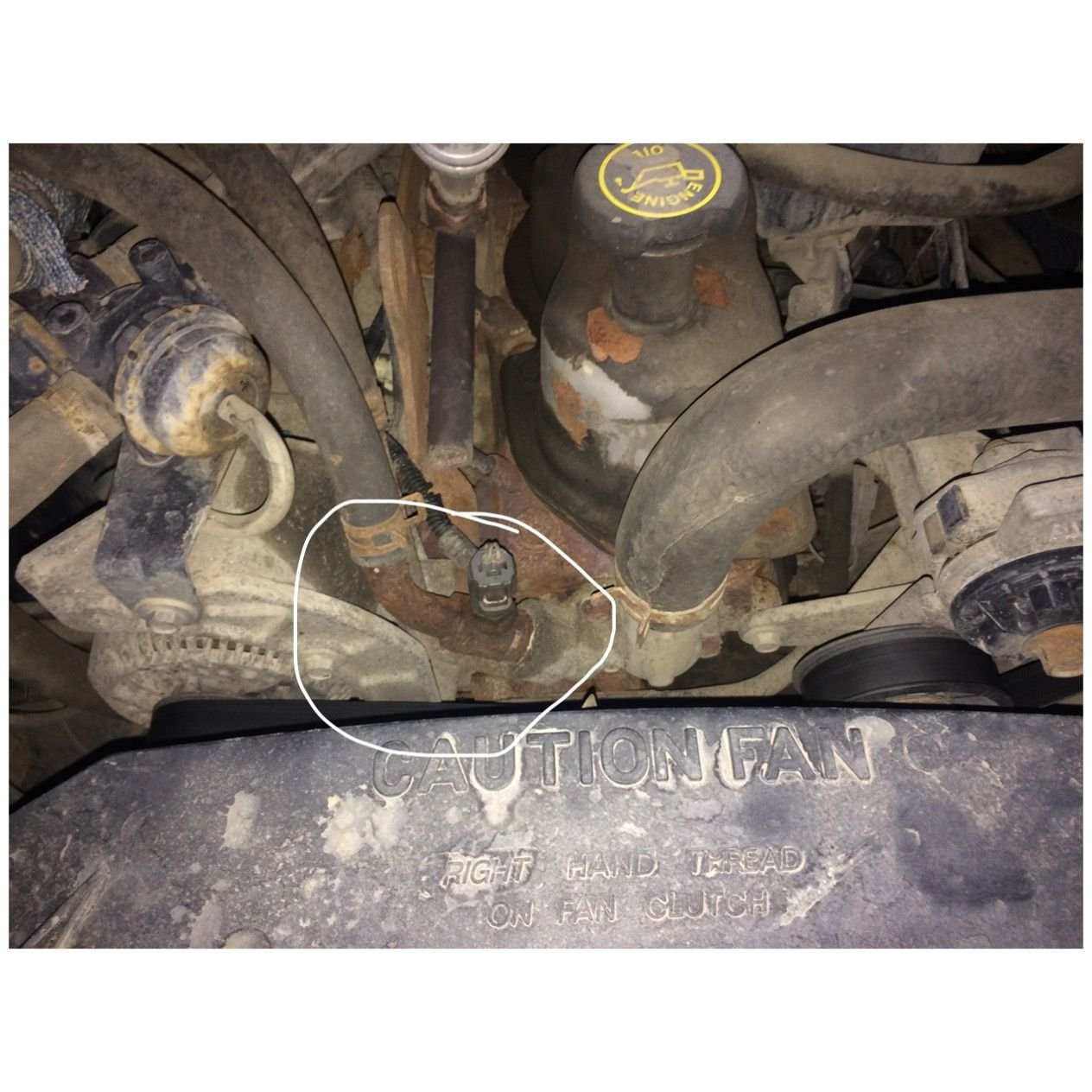 What is the part name or part code for the temp sensor housing? Ford