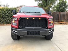 Raptor style grille and bumper with LED flood and spot lights (bumper plastidipped black)