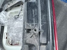 Passenger side taillight, cracks and broken tabs