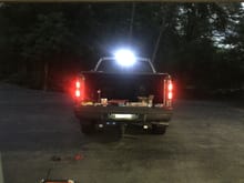 LEDs on the left vs. stock bulbs on the right (brake light applied) don't mind my bright cargo lights lol
