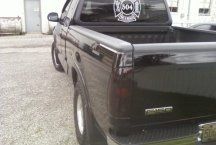 Smoked Tail lights and 4X4 decals removed New 04  Emblems installed