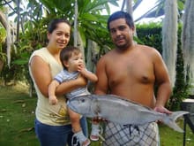 My wife, my son (Da Prodigy) and me. I caught dis 15lbs Grey snapper(Uku hawaiian name) while shore casting last week!!