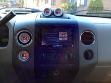 New Pioneer AVH 8500 stereo and relocated Auto-Meter Gauges.