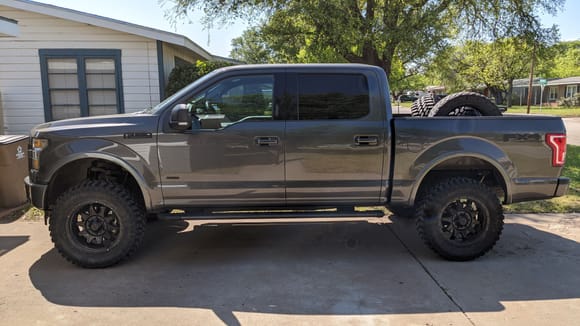 Really need to take some better quality pics of my truck 

I also plan to replace the rims at some point with some Black Rhino Stadium wheels(I think)
