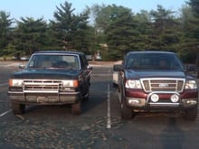 classy &quot;SUV&quot; on the left and the trashy truck on the right ... haha