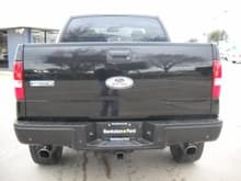 Ford Racing Tailgate Emblem, Black Bumper equipped with Back-Up Sensors, Ford Racing Dual Exhaust, OEM Locking Tailgate handle
