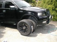 Tire next to truck front