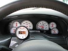Autometer Lunar Gauge Cluster(Replaced OEM)/Innovate Motorsports Air-fuel Gauge

NOTE: since this pic, steering wheel has been replaced with one that was done in PatternTek(Blackwood print)