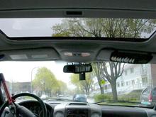 Inside the cab, front view with a view of the moonroof.