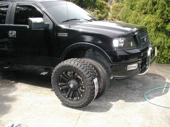 Tire next to truck front