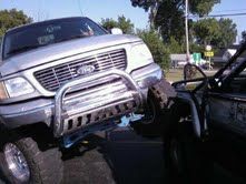 climbing on my buddies jeep with 35'' bogger with out any ramps in 4low and yes yes i push in his fender as well oops