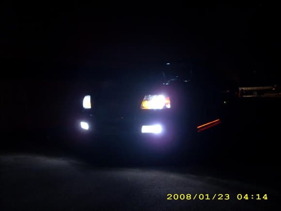 Blue halogen bulbs in heads and fogs. HIDs have replaced the fogs bulbs now.