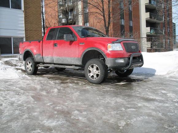 With stock tires and rims