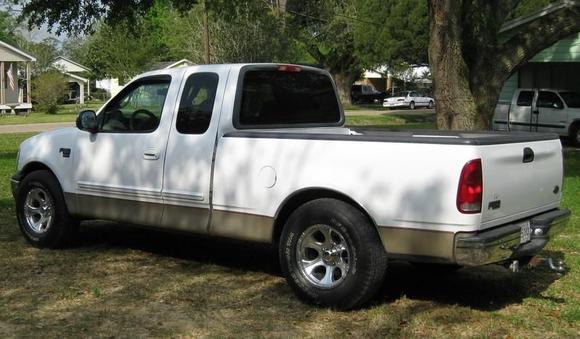 truck with tires and rims lowered two inchs in rear!