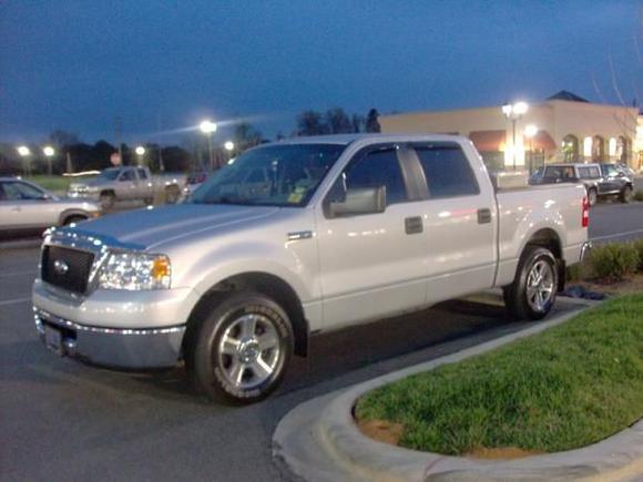 in the parking lot at work with the stock grille still mounted.
