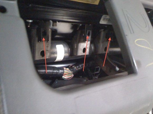 underneath the air bag part above the glove box you will need to remove these three screws to be able to pull the airbag off