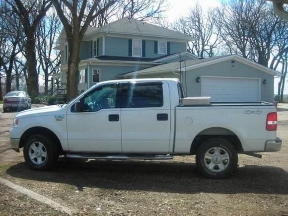mostly stock  i threw my tool box in the back ,got exhaust and smoke visors..... still had dealer plates on it