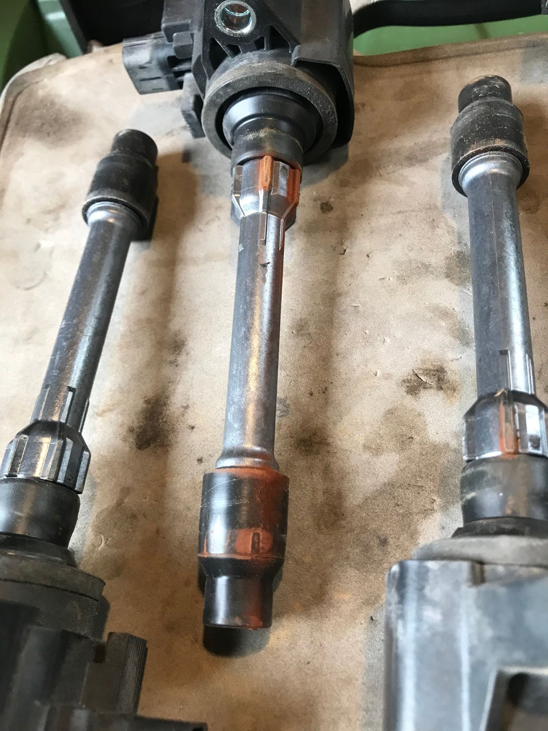 Cylinder 2 coil pack had some noticeable red/terra Cotta looking marks. I wonder what this could be. 