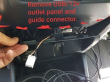 It might help to remove USB/12V outlet panel to help guide plug and drivers side connections. 