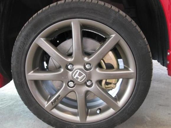 This how it looks under a 16" accessory wheel. BUT, there is not room between the caliper and the wheel. Need to install 3-mm wheel spacers and longer studs...so close, yet so far!