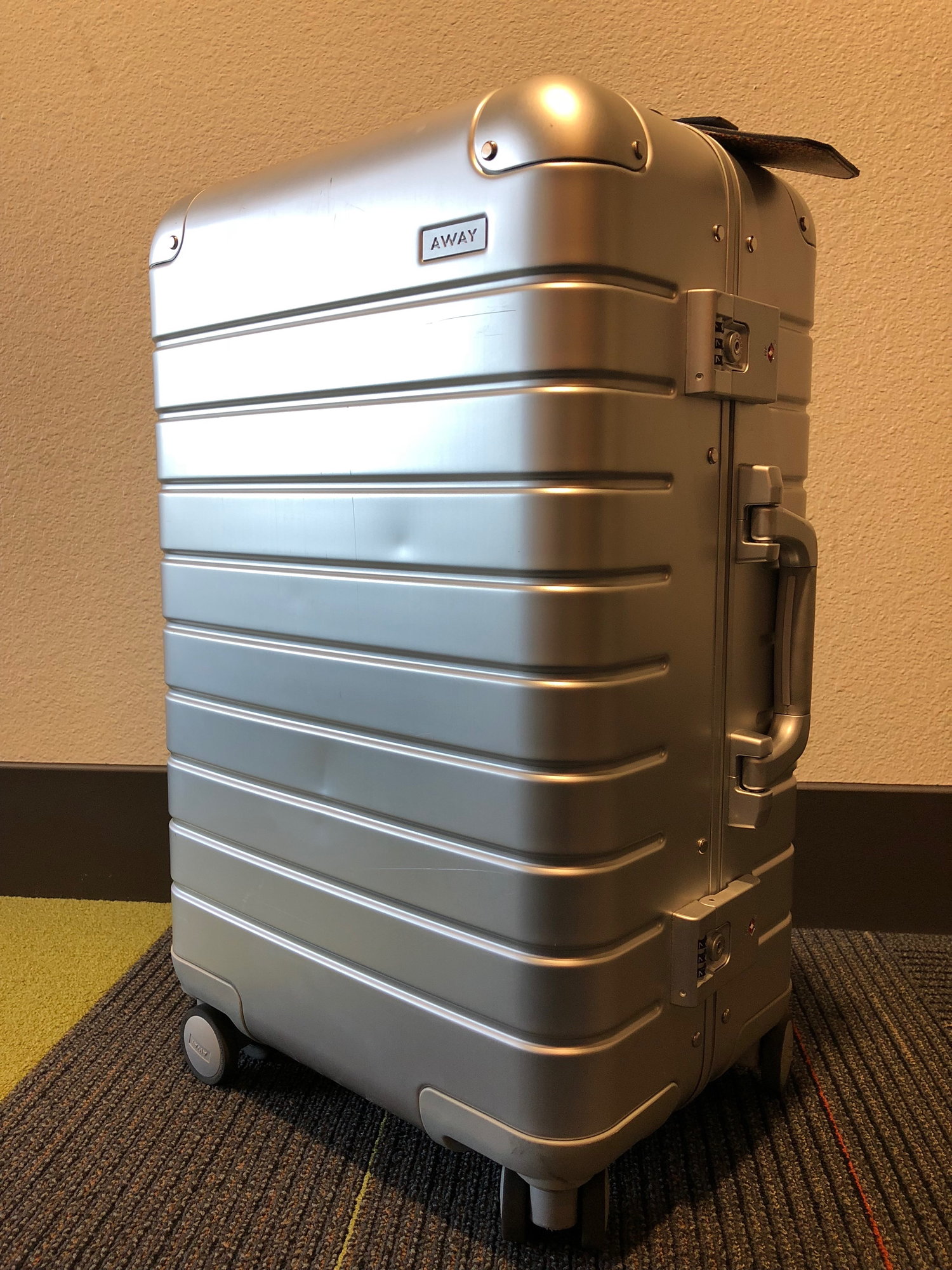 away aluminum luggage vs rimowa