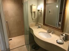 Shower and sink in bathroom 