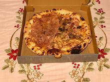 Lino pizza , mushrooms with half / half - added bacon & prosciutto
