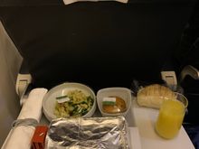 CDG-IST: tray came with all containers covered in plastic or foil. Also bread served separately in plastic; bubbly available