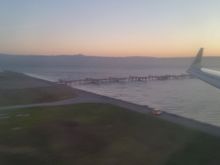 I fell asleep but soon after I looked out the window and saw the familiar view of 28L at SFO.